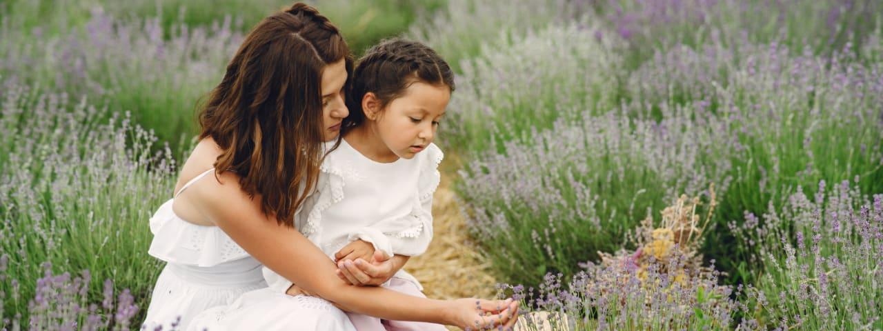 Mother and daughter together in a lavender field